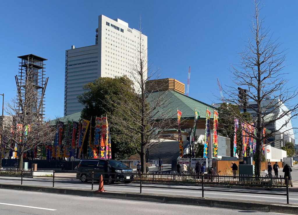 Ryogoku Kokugikan adorned with Banner for January Sumo Tournament, Tokyo Walking Guide